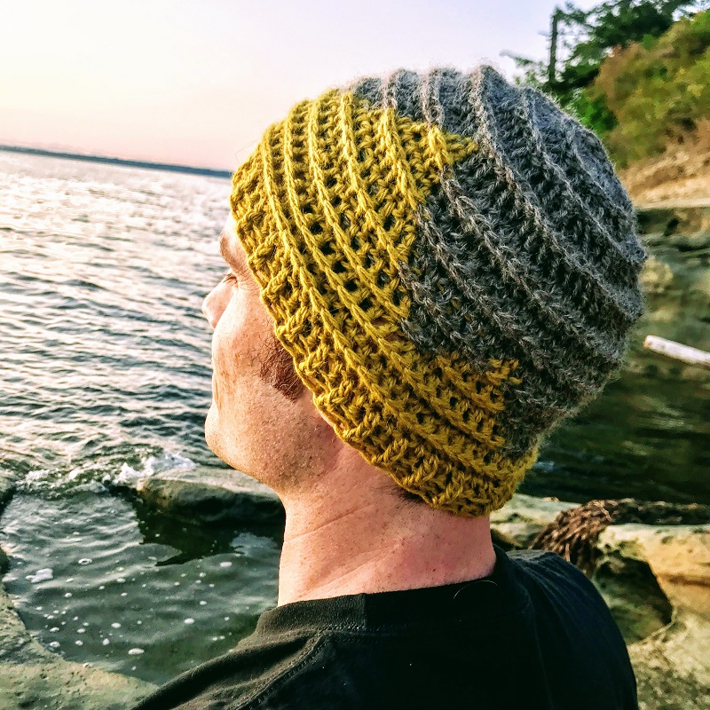 Photo of a guy wearing the Twin Sisters beanie
